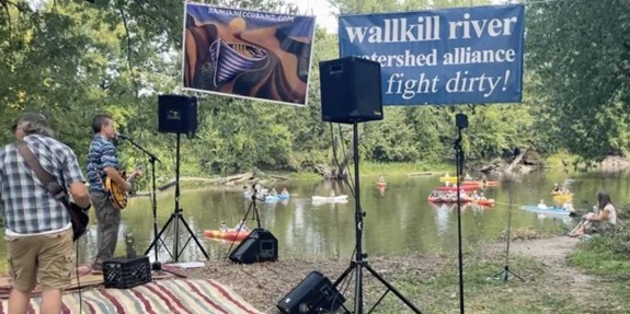 Music on the Wallkill paddle event with musicians and paddlers